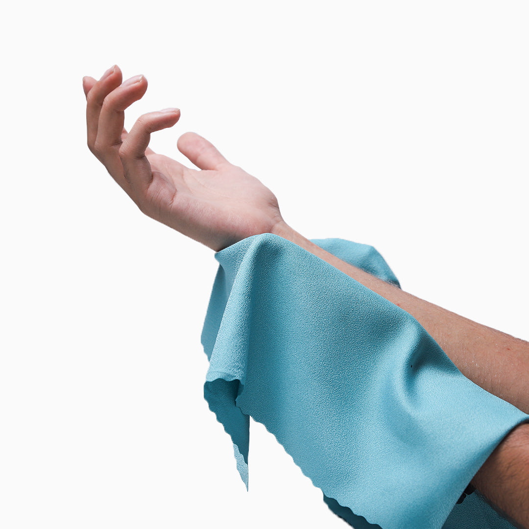Towel is being used to dry the body after ablution