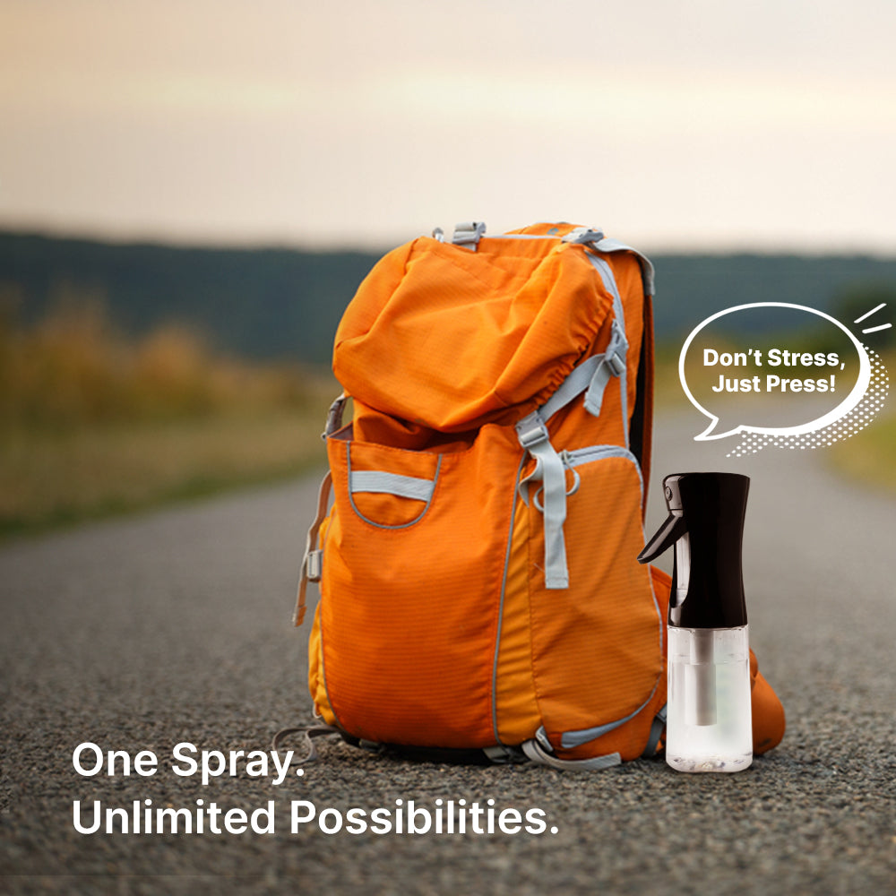 ABDEEZ Continuous Wudhu Spray 21 An ABDEEZ Continuous Wudhu Spray placed beside a backpack on a road, highlighting its portability and convenience with the caption 'One Spray. Unlimited Possibilities.