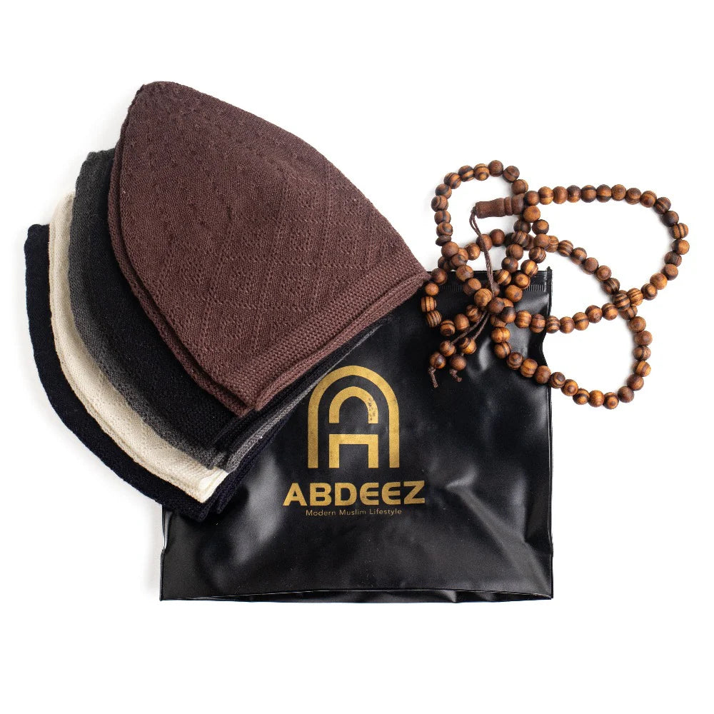 pink and blue wudhu towels on a black background