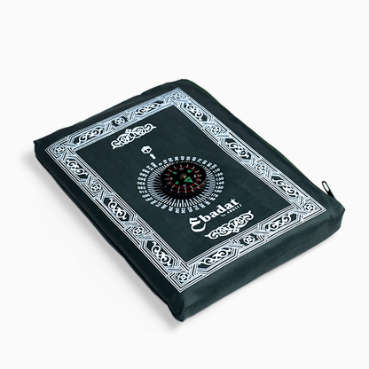 A portable prayer mat with a built-in Qibla compass