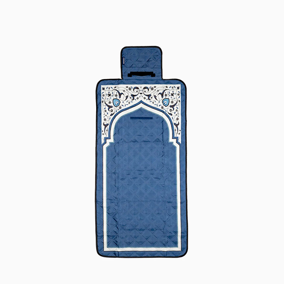 Blue portable prayer mat with decorative border