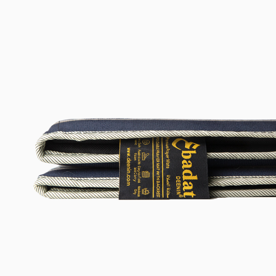 a close up view of stitching done on the blue ebadat prayer rug