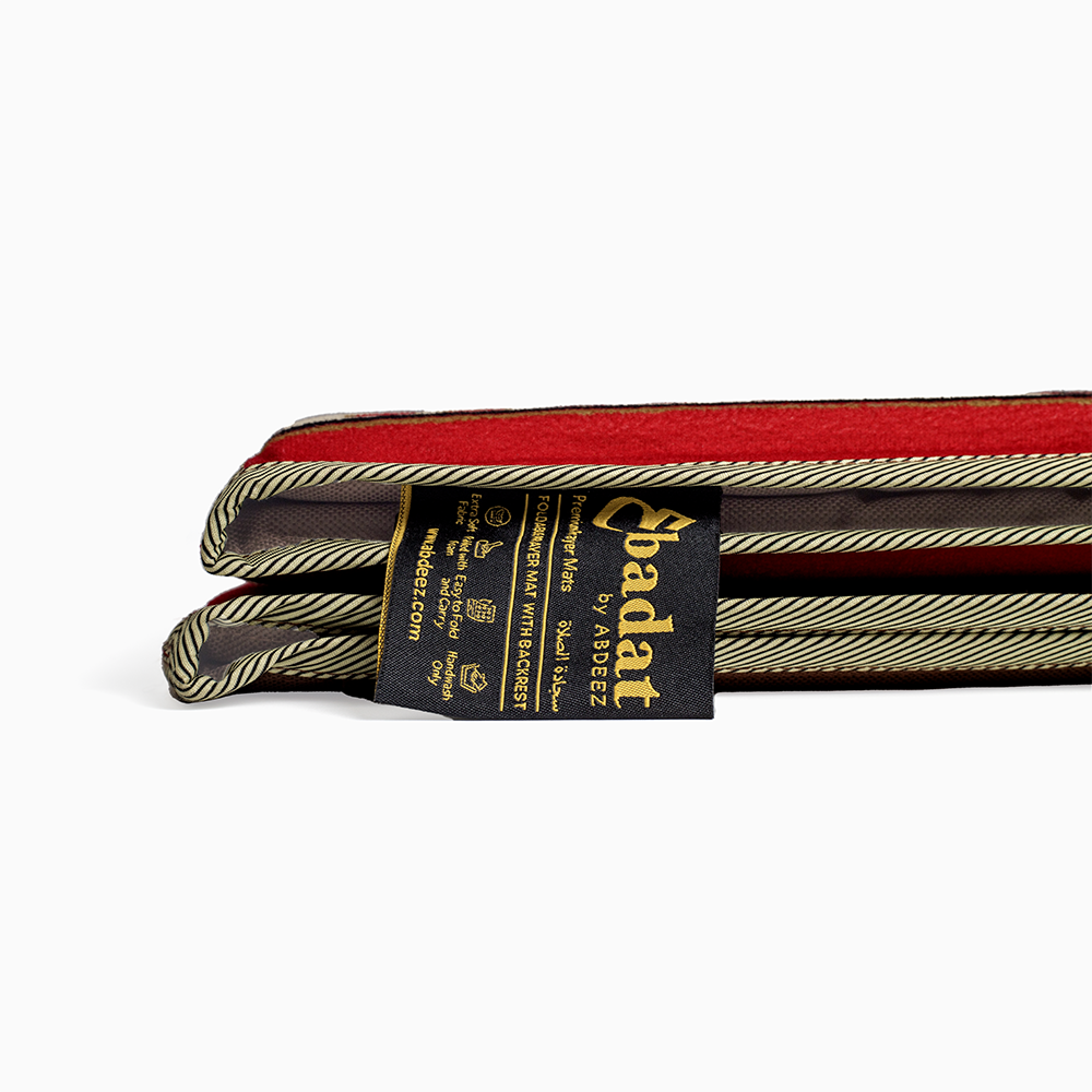 a close up view showing the stitching on the lava red portable ebadat prayer rug