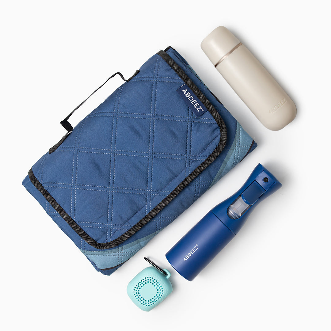 A top-down view of bundle products including portable bidet, wudhu spray, wudhu towel, and SalahTrek™.