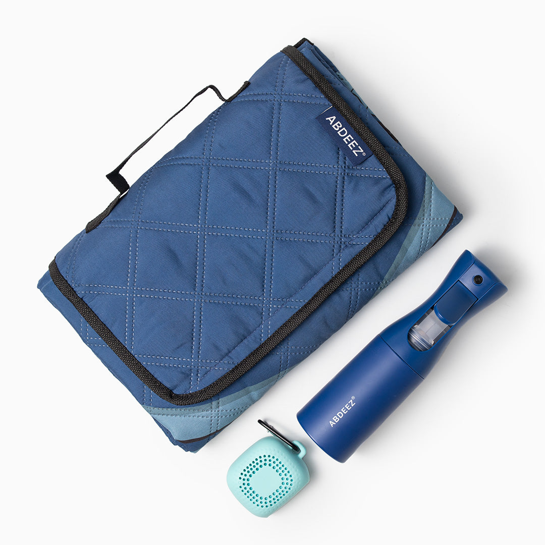 A top-down image showing products within a bundle (continuous wudhu spray, ablution towel, and SalahTrek™)