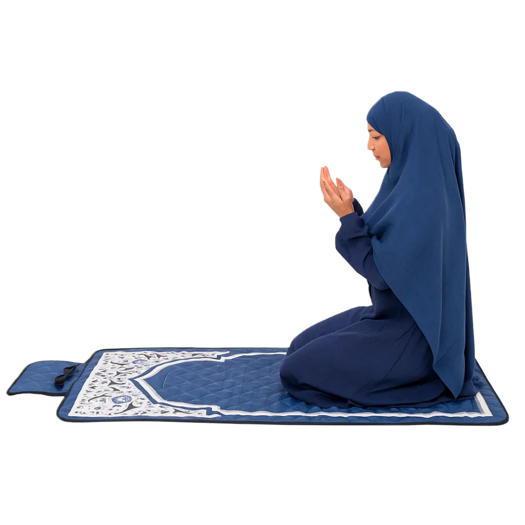 Woman praying on Salah Trek unfolded on the ground