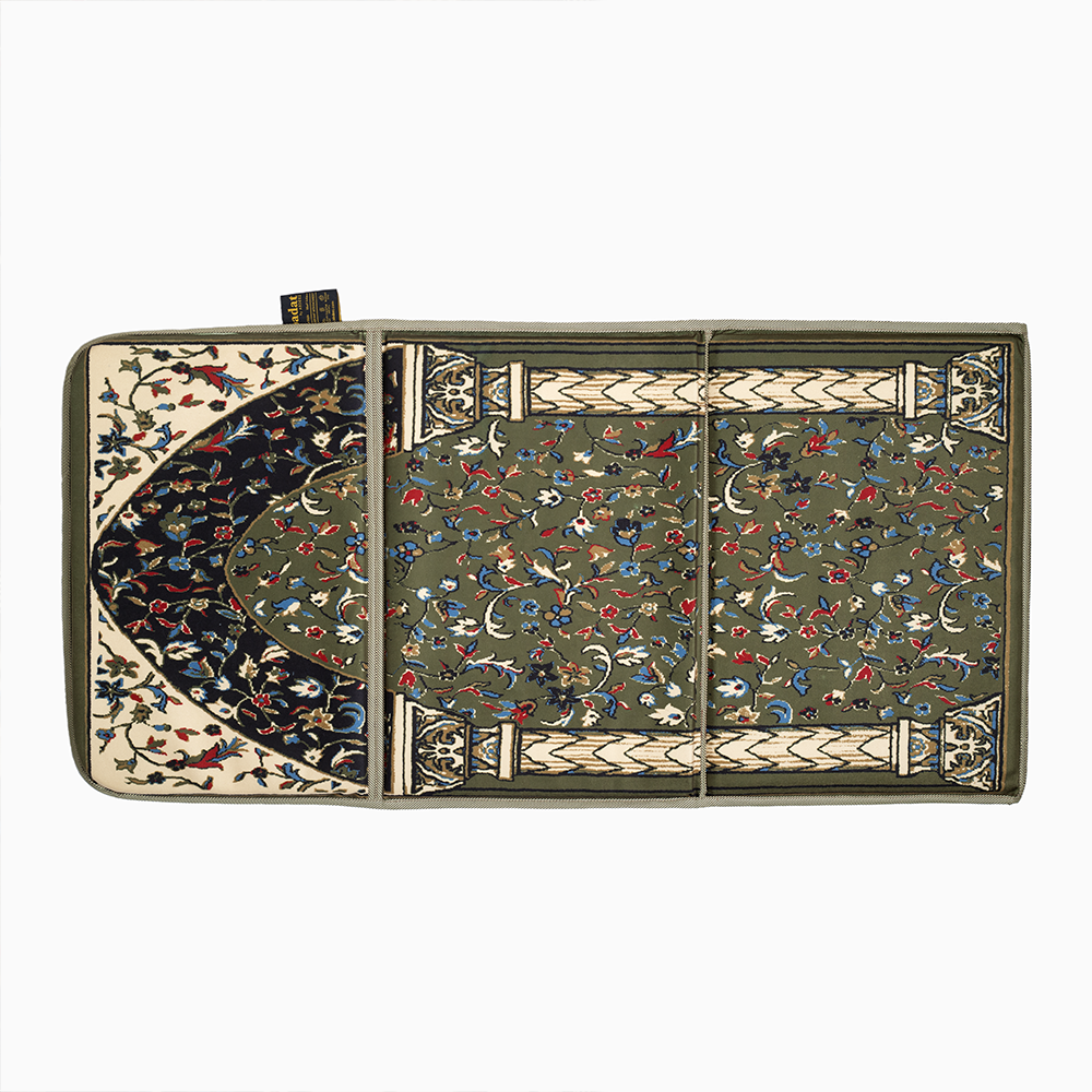 an earth green ebadat prayer rug lying on ground