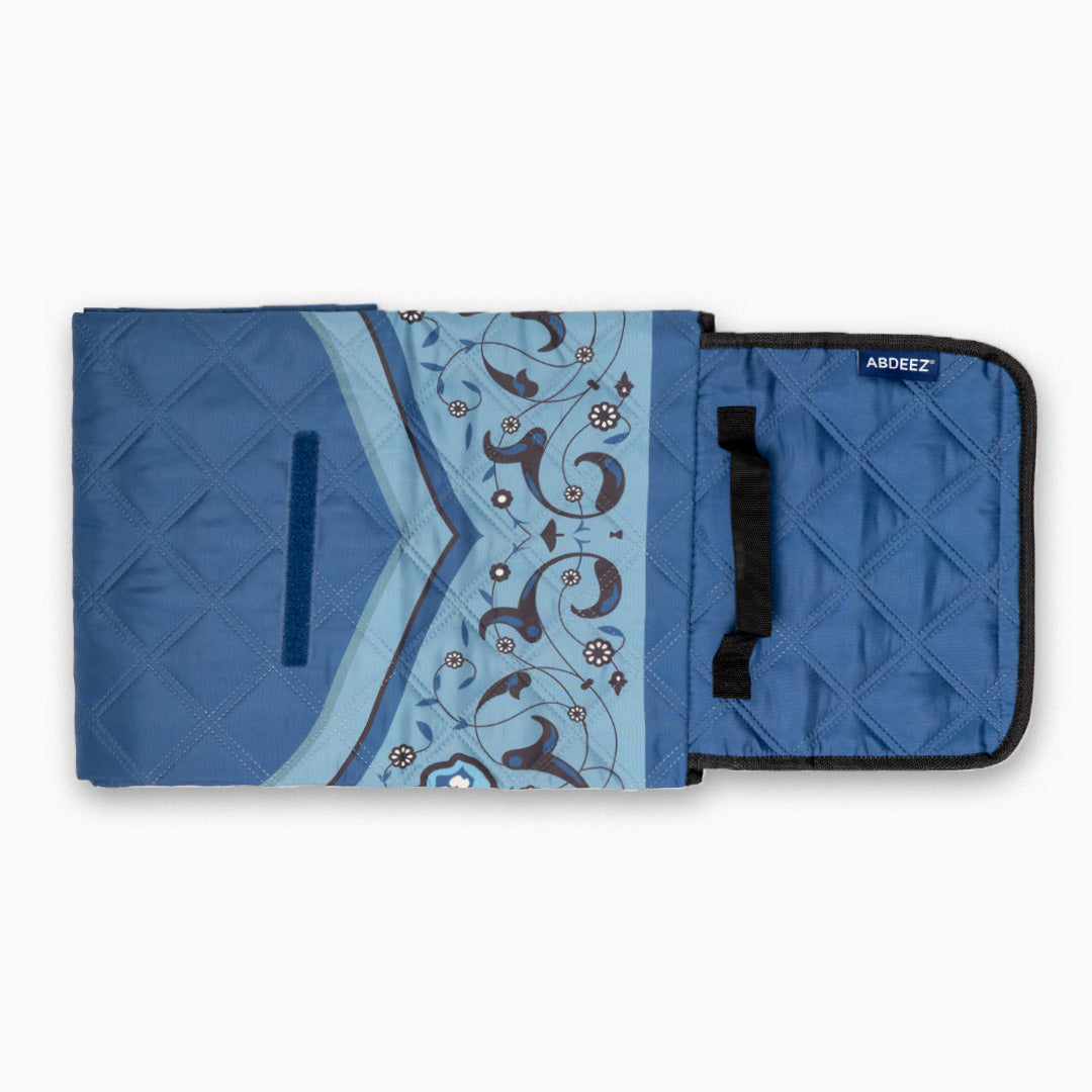 Blue prayer mat half folded