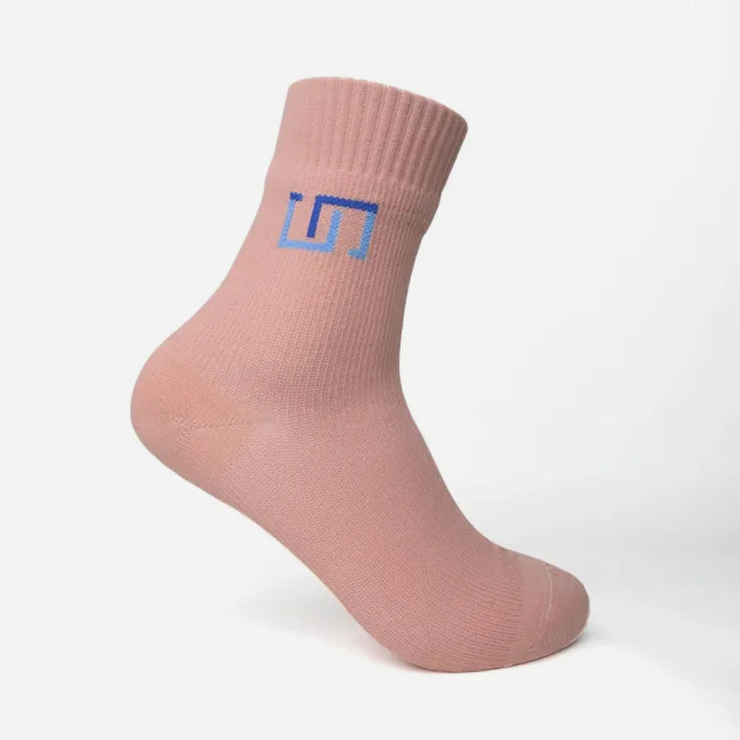 tea pink sock with a white background