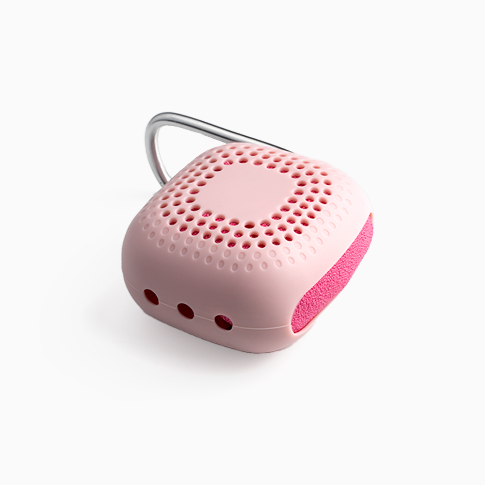 pink portable wudhu towel in its casing 
